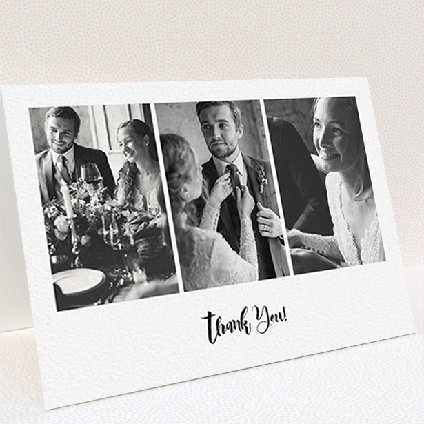 A wedding thank you card named "Modern Tryptic". It is an A6 card in a landscape orientation. It is a photographic wedding thank you card with room for 3 photos. "Modern Tryptic" is available as a folded card, with mainly white colouring.