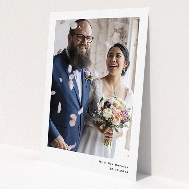 A wedding thank you card called 'Most of the page'. It is an A6 card in a portrait orientation. It is a photographic wedding thank you card with room for 1 photo. 'Most of the page' is available as a flat card, with mainly white colouring.