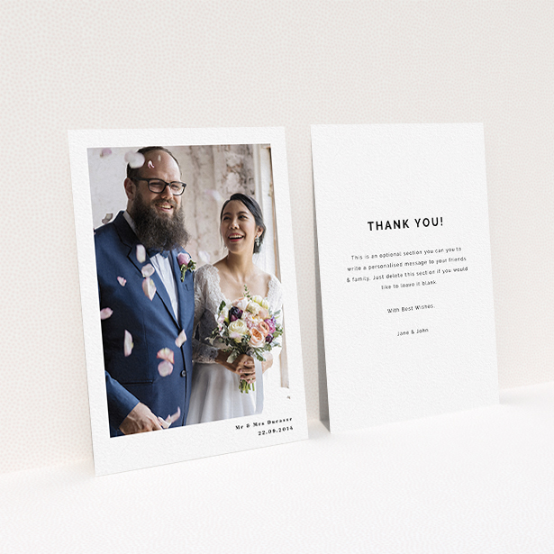 A wedding thank you card called "Most of the page". It is an A6 card in a portrait orientation. It is a photographic wedding thank you card with room for 1 photo. "Most of the page" is available as a flat card, with mainly white colouring.