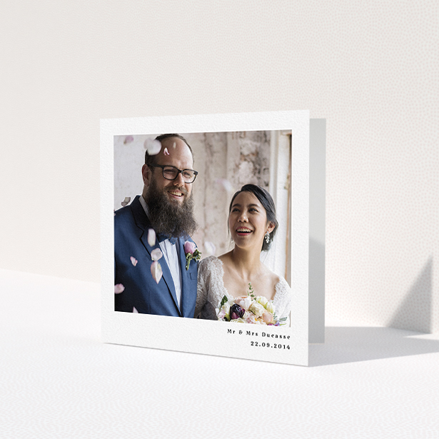 A wedding thank you card design named 'Most of the page'. It is a square (148mm x 148mm) card in a square orientation. It is a photographic wedding thank you card with room for 1 photo. 'Most of the page' is available as a folded card, with mainly white colouring.