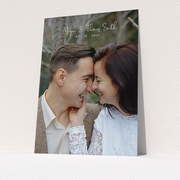 A wedding thank you card called "Name-Date-Photo". It is an A6 card in a portrait orientation. It is a photographic wedding thank you card with room for 1 photo. "Name-Date-Photo" is available as a flat card, with mainly white colouring.