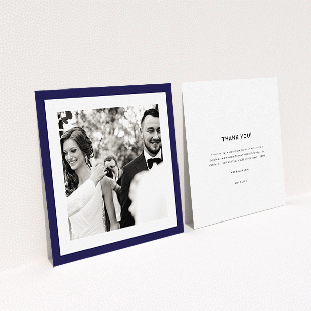 A wedding thank you card called "Navy Border". It is a square (148mm x 148mm) card in a square orientation. It is a photographic wedding thank you card with room for 1 photo. "Navy Border" is available as a flat card, with tones of blue and white.