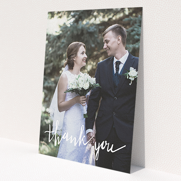 A wedding thank you card called 'New to calligraphy'. It is an A6 card in a portrait orientation. It is a photographic wedding thank you card with room for 1 photo. 'New to calligraphy' is available as a flat card, with mainly white colouring.