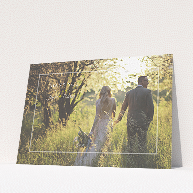 A wedding thank you card design called "Not even there". It is an A6 card in a landscape orientation. It is a photographic wedding thank you card with room for 1 photo. "Not even there" is available as a flat card, with mainly white colouring.