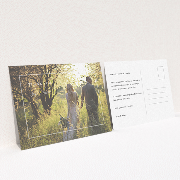 A wedding thank you card design called "Not even there". It is an A6 card in a landscape orientation. It is a photographic wedding thank you card with room for 1 photo. "Not even there" is available as a flat card, with mainly white colouring.