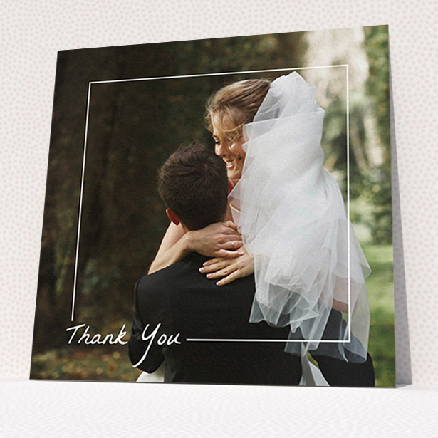 A wedding thank you card named "On Photo Border". It is a square (148mm x 148mm) card in a square orientation. It is a photographic wedding thank you card with room for 1 photo. "On Photo Border" is available as a flat card, with mainly white colouring.