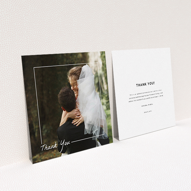 A wedding thank you card named "On Photo Border". It is a square (148mm x 148mm) card in a square orientation. It is a photographic wedding thank you card with room for 1 photo. "On Photo Border" is available as a flat card, with mainly white colouring.