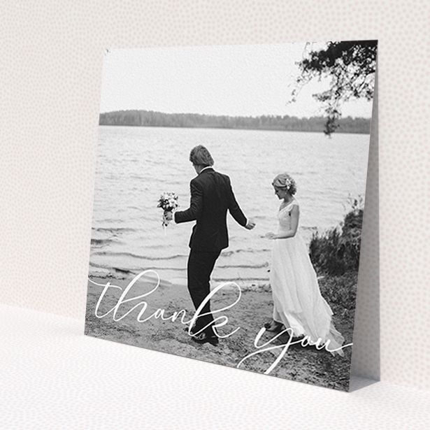 A wedding thank you card design named 'One Photo'. It is a square (148mm x 148mm) card in a square orientation. It is a photographic wedding thank you card with room for 1 photo. 'One Photo' is available as a flat card, with mainly white colouring.