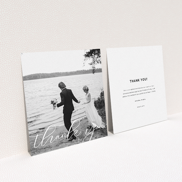A wedding thank you card design named "One Photo". It is a square (148mm x 148mm) card in a square orientation. It is a photographic wedding thank you card with room for 1 photo. "One Photo" is available as a flat card, with mainly white colouring.