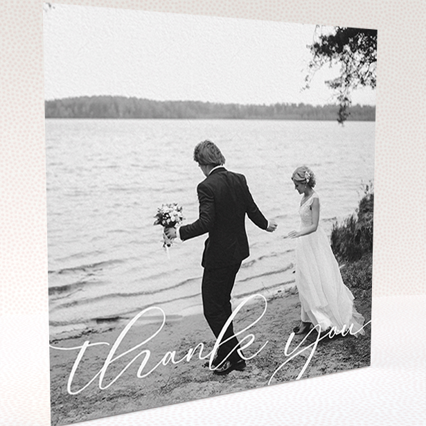 A wedding thank you card design titled "One Photo". It is a square (148mm x 148mm) card in a square orientation. It is a photographic wedding thank you card with room for 1 photo. "One Photo" is available as a folded card, with mainly white colouring.