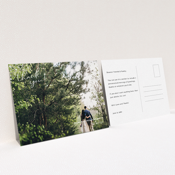 A wedding thank you card called "Opposite Photo Corners". It is an A6 card in a landscape orientation. It is a photographic wedding thank you card with room for 1 photo. "Opposite Photo Corners" is available as a flat card, with mainly white colouring.