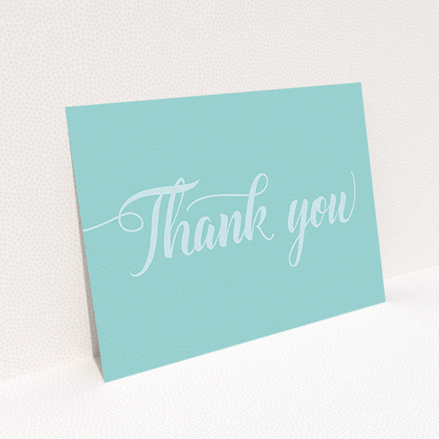 A wedding thank you card design called "Pastel blue calligraphy". It is an A6 card in a landscape orientation. "Pastel blue calligraphy" is available as a flat card, with mainly blue colouring.