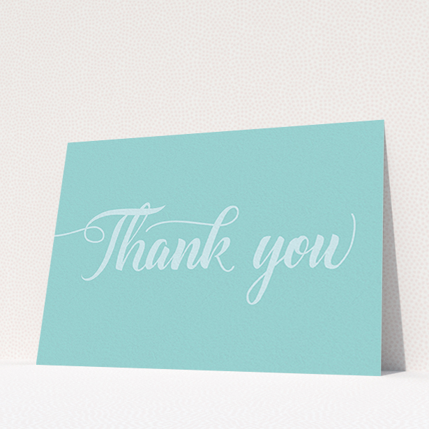 A wedding thank you card design called "Pastel blue calligraphy". It is an A6 card in a landscape orientation. "Pastel blue calligraphy" is available as a flat card, with mainly blue colouring.