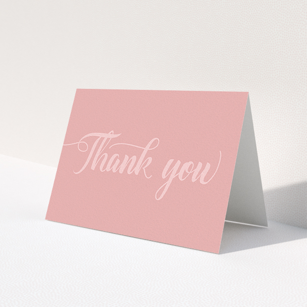 A wedding thank you card design titled 'Pastel pink calligraphy'. It is an A6 card in a landscape orientation. 'Pastel pink calligraphy' is available as a folded card, with mainly pink colouring.