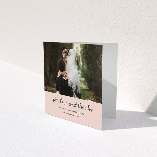 A wedding thank you card called "Pink Footer". It is a square (148mm x 148mm) card in a square orientation. It is a photographic wedding thank you card with room for 1 photo. "Pink Footer" is available as a folded card, with mainly pink colouring.