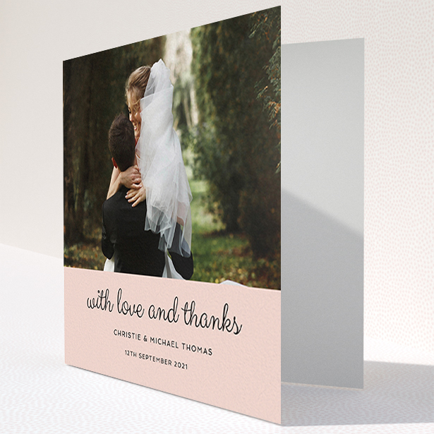 A wedding thank you card called "Pink Footer". It is a square (148mm x 148mm) card in a square orientation. It is a photographic wedding thank you card with room for 1 photo. "Pink Footer" is available as a folded card, with mainly pink colouring.