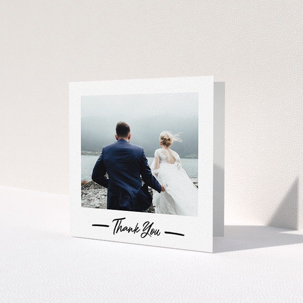 A wedding thank you card called 'Portrait Thank You Photo'. It is a square (148mm x 148mm) card in a square orientation. It is a photographic wedding thank you card with room for 1 photo. 'Portrait Thank You Photo' is available as a folded card, with mainly white colouring.