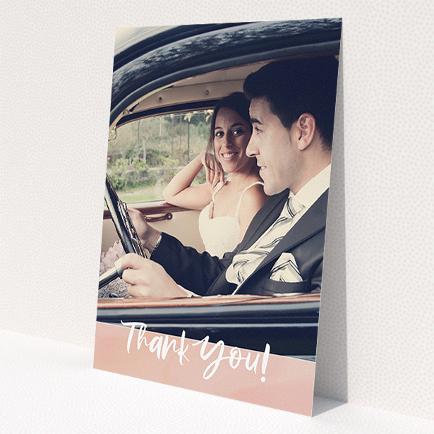 A wedding thank you card named 'Pretty on Pink'. It is an A5 card in a portrait orientation. It is a photographic wedding thank you card with room for 1 photo. 'Pretty on Pink' is available as a flat card, with tones of pink and white.