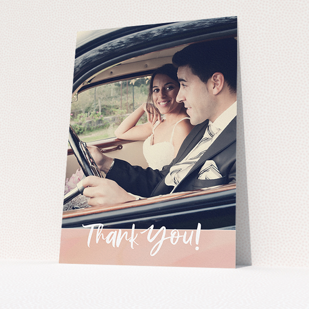 A wedding thank you card named "Pretty on Pink". It is an A5 card in a portrait orientation. It is a photographic wedding thank you card with room for 1 photo. "Pretty on Pink" is available as a flat card, with tones of pink and white.