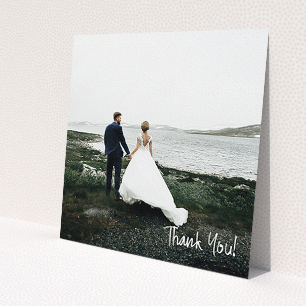 A wedding thank you card design named 'Rough but Simple Photo'. It is a square (148mm x 148mm) card in a square orientation. It is a photographic wedding thank you card with room for 1 photo. 'Rough but Simple Photo' is available as a flat card, with mainly white colouring.