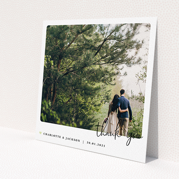 A wedding thank you card design titled 'Rounded-Off with Thanks'. It is a square (148mm x 148mm) card in a square orientation. It is a photographic wedding thank you card with room for 1 photo. 'Rounded-Off with Thanks' is available as a flat card, with mainly white colouring.