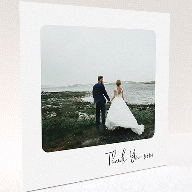 A wedding thank you card named "Rounded Thanks". It is a square (148mm x 148mm) card in a square orientation. It is a photographic wedding thank you card with room for 1 photo. "Rounded Thanks" is available as a folded card, with mainly white colouring.