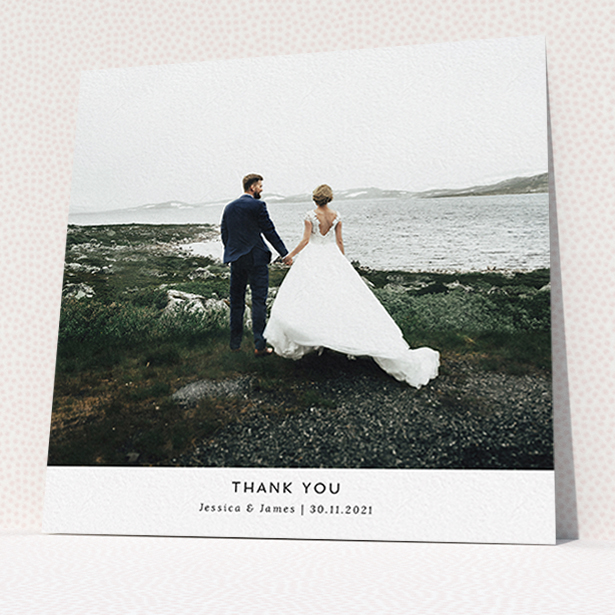 A wedding thank you card called "Sans Serif". It is a square (148mm x 148mm) card in a square orientation. It is a photographic wedding thank you card with room for 1 photo. "Sans Serif" is available as a flat card, with mainly white colouring.
