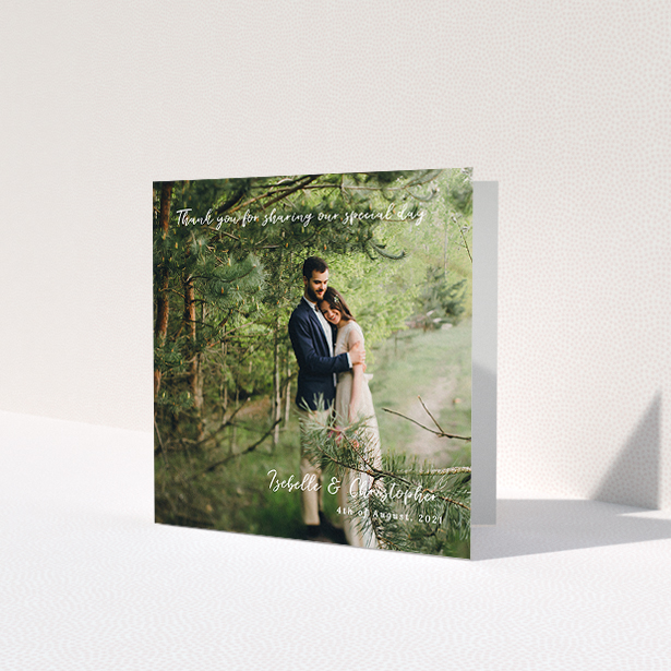 A wedding thank you card design called 'Scripted'. It is a square (148mm x 148mm) card in a square orientation. It is a photographic wedding thank you card with room for 1 photo. 'Scripted' is available as a folded card, with mainly white colouring.