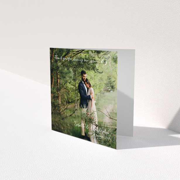 A wedding thank you card design called "Scripted". It is a square (148mm x 148mm) card in a square orientation. It is a photographic wedding thank you card with room for 1 photo. "Scripted" is available as a folded card, with mainly white colouring.