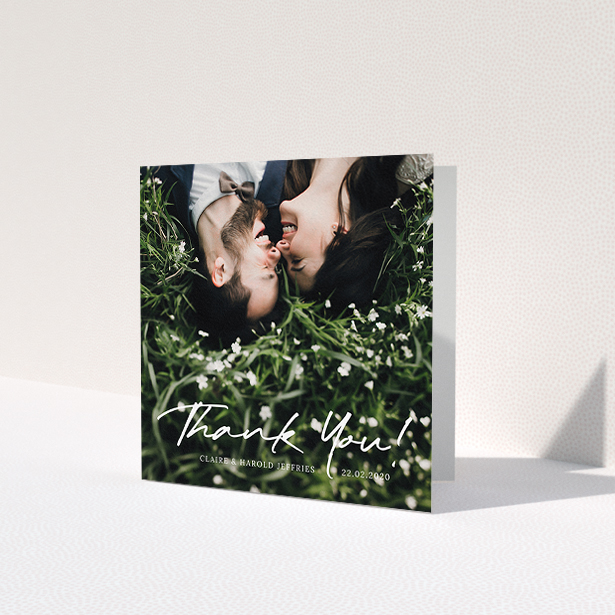A wedding thank you card design named 'Simple Appreciation'. It is a square (148mm x 148mm) card in a square orientation. It is a photographic wedding thank you card with room for 1 photo. 'Simple Appreciation' is available as a folded card, with mainly white colouring.