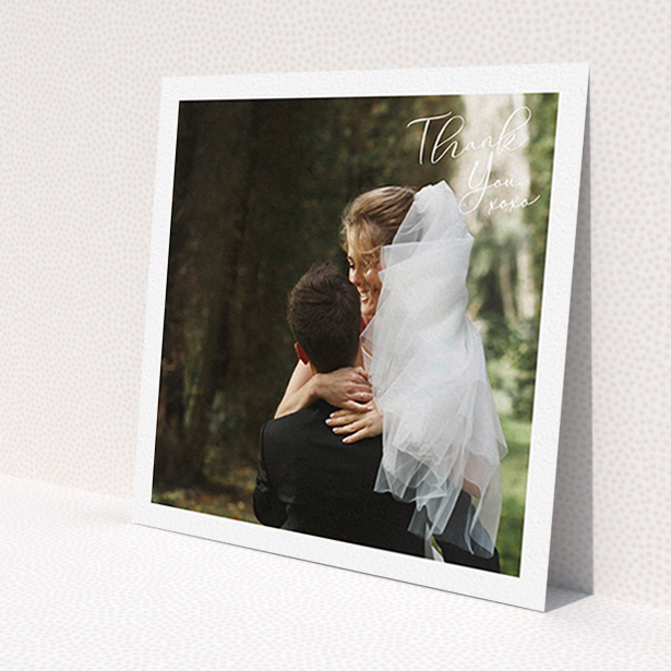 A wedding thank you card design called 'Simple Landscape Thanks'. It is a square (148mm x 148mm) card in a square orientation. It is a photographic wedding thank you card with room for 1 photo. 'Simple Landscape Thanks' is available as a flat card, with mainly white colouring.