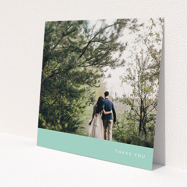 A wedding thank you card template titled 'Simple Mint'. It is a square (148mm x 148mm) card in a square orientation. It is a photographic wedding thank you card with room for 1 photo. 'Simple Mint' is available as a flat card, with tones of green and white.