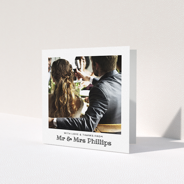 A wedding thank you card called 'Simple Photo Frame'. It is a square (148mm x 148mm) card in a square orientation. It is a photographic wedding thank you card with room for 1 photo. 'Simple Photo Frame' is available as a folded card, with mainly white colouring.