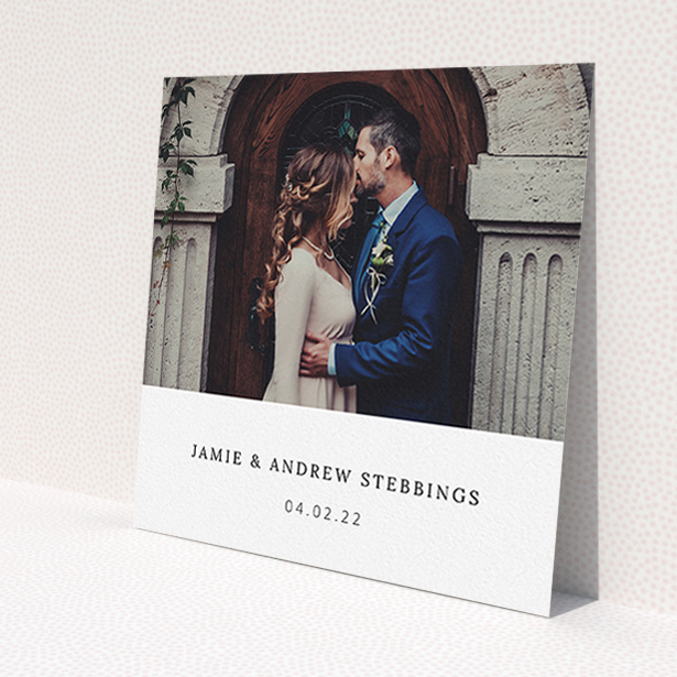 A wedding thank you card template titled 'Simple, Portrait Thank You'. It is a square (148mm x 148mm) card in a square orientation. It is a photographic wedding thank you card with room for 1 photo. 'Simple, Portrait Thank You' is available as a flat card, with mainly white colouring.