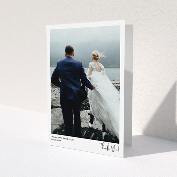 A wedding thank you card design titled 'Simple Wedding Thank You'. It is an A6 card in a portrait orientation. It is a photographic wedding thank you card with room for 1 photo. 'Simple Wedding Thank You' is available as a folded card, with mainly white colouring.