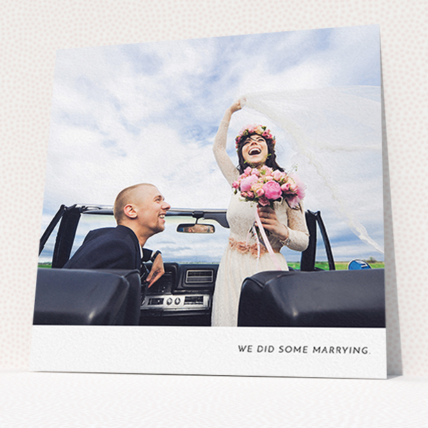 A wedding thank you card named "Split into two". It is a square (148mm x 148mm) card in a square orientation. It is a photographic wedding thank you card with room for 2 photos. "Split into two" is available as a flat card, with mainly white colouring.