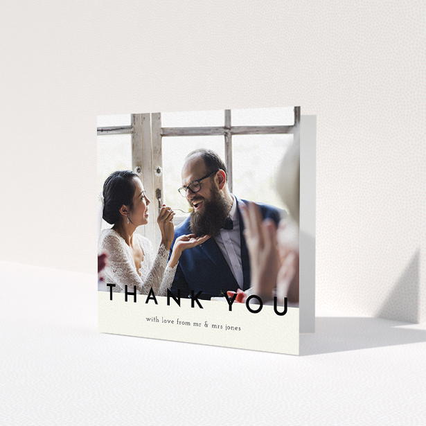 A wedding thank you card called 'Split thank you '. It is a square (148mm x 148mm) card in a square orientation. It is a photographic wedding thank you card with room for 1 photo. 'Split thank you ' is available as a folded card, with mainly cream colouring.