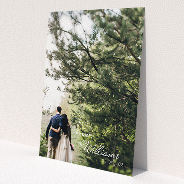 A wedding thank you card design called 'Thanks Bottom-Right'. It is an A6 card in a portrait orientation. It is a photographic wedding thank you card with room for 1 photo. 'Thanks Bottom-Right' is available as a flat card, with mainly white colouring.