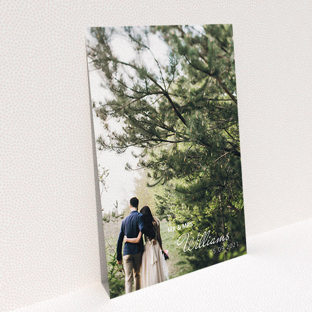 A wedding thank you card design called "Thanks Bottom-Right". It is an A6 card in a portrait orientation. It is a photographic wedding thank you card with room for 1 photo. "Thanks Bottom-Right" is available as a flat card, with mainly white colouring.