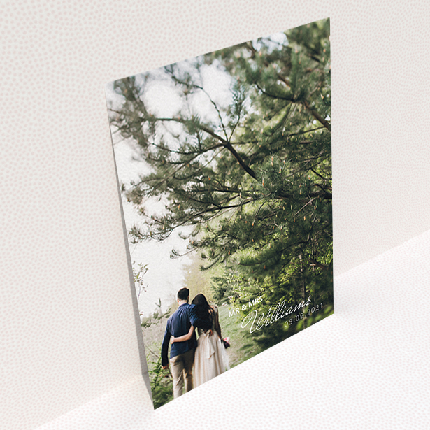 A wedding thank you card design called "Thanks Bottom-Right". It is an A6 card in a portrait orientation. It is a photographic wedding thank you card with room for 1 photo. "Thanks Bottom-Right" is available as a flat card, with mainly white colouring.