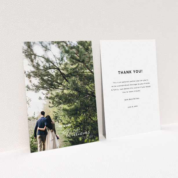 A wedding thank you card design called "Thanks Bottom-Right". It is an A6 card in a portrait orientation. It is a photographic wedding thank you card with room for 1 photo. "Thanks Bottom-Right" is available as a flat card, with mainly white colouring.