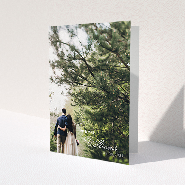A wedding thank you card design titled 'Thanks Bottom-Right'. It is an A6 card in a portrait orientation. It is a photographic wedding thank you card with room for 1 photo. 'Thanks Bottom-Right' is available as a folded card, with mainly white colouring.