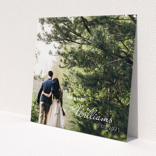 A wedding thank you card called 'Thanks Bottom-Right'. It is a square (148mm x 148mm) card in a square orientation. It is a photographic wedding thank you card with room for 1 photo. 'Thanks Bottom-Right' is available as a flat card, with mainly white colouring.