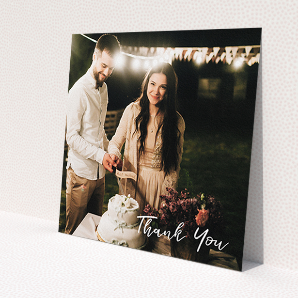 A wedding thank you card design called 'Thanks From The Corner'. It is a square (148mm x 148mm) card in a square orientation. It is a photographic wedding thank you card with room for 1 photo. 'Thanks From The Corner' is available as a flat card, with mainly white colouring.