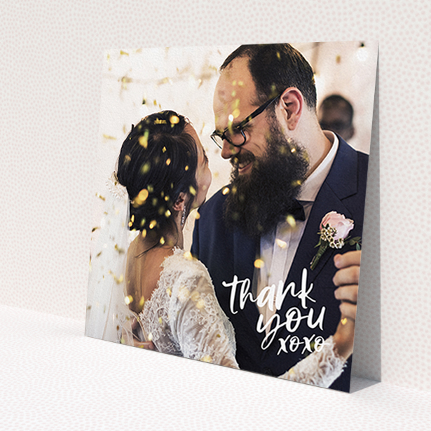 A wedding thank you card named 'Thanks In the Corner'. It is a square (148mm x 148mm) card in a square orientation. It is a photographic wedding thank you card with room for 1 photo. 'Thanks In the Corner' is available as a flat card, with mainly white colouring.