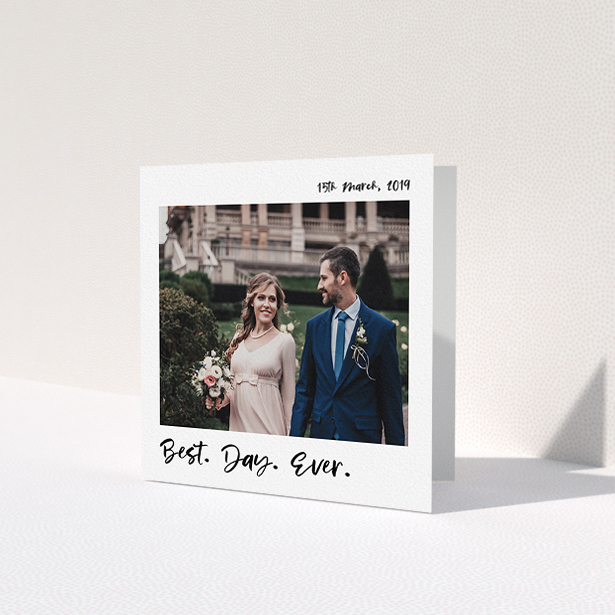 A wedding thank you card called 'Top and Bottom Thanks'. It is a square (148mm x 148mm) card in a square orientation. It is a photographic wedding thank you card with room for 1 photo. 'Top and Bottom Thanks' is available as a folded card, with mainly white colouring.