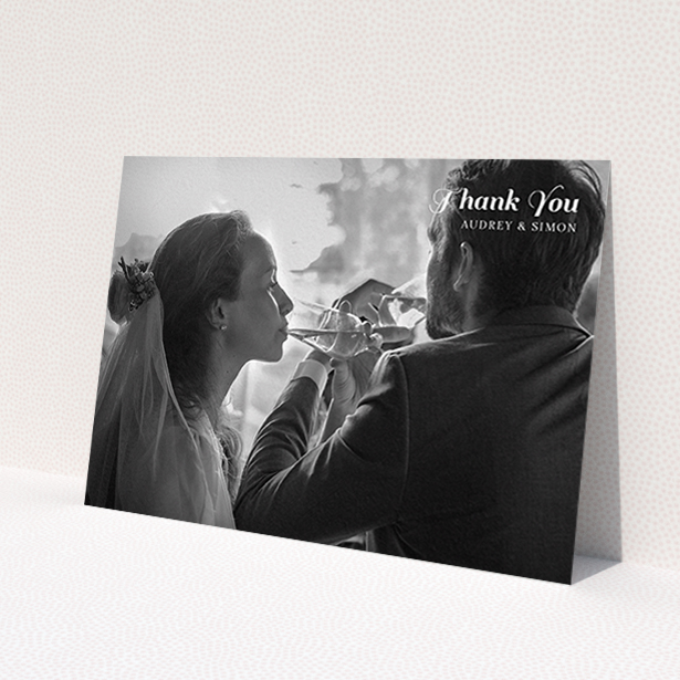 A wedding thank you card template titled 'Top-Right'. It is an A6 card in a landscape orientation. It is a photographic wedding thank you card with room for 1 photo. 'Top-Right' is available as a flat card, with mainly white colouring.