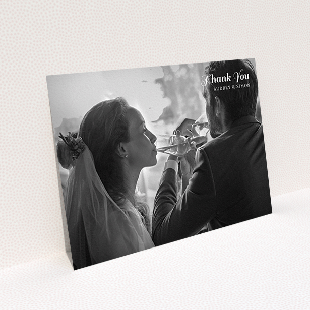 A wedding thank you card template titled "Top-Right". It is an A6 card in a landscape orientation. It is a photographic wedding thank you card with room for 1 photo. "Top-Right" is available as a flat card, with mainly white colouring.