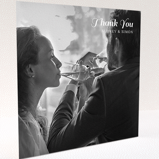 A wedding thank you card named "Top-Right". It is a square (148mm x 148mm) card in a square orientation. It is a photographic wedding thank you card with room for 1 photo. "Top-Right" is available as a folded card, with mainly white colouring.