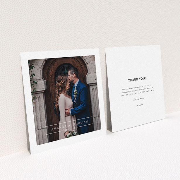 A wedding thank you card design titled "Tramlines". It is a square (148mm x 148mm) card in a square orientation. It is a photographic wedding thank you card with room for 1 photo. "Tramlines" is available as a flat card, with mainly white colouring.